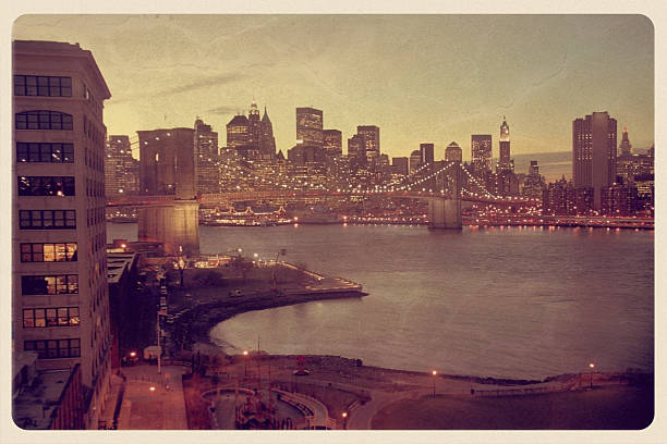 Manhattan Skyline Postcard - Grunge Retro-styled postcard of southern Manhattan an night. brooklyn new york photos stock pictures, royalty-free photos & images