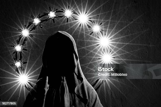 The Dark Prayer Stock Photo - Download Image Now - Virgin Mary, Dark, Electric Light