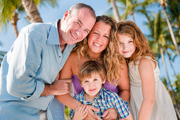 istock Happy parents and their children 182717926