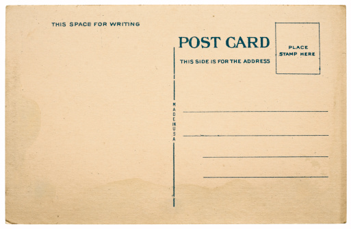 The back of an vintage postcard