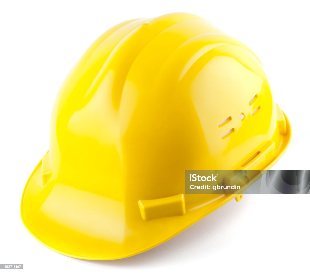 Amarillo casco de construcción aislado sobre blanco - Foto de stock de Accesorio de cabeza libre de derechos