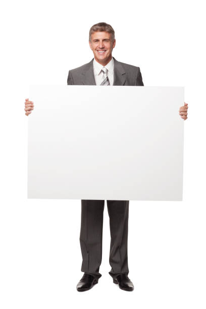 istock Handsome Businessman Holding Blank Sigm. Isolated 182718362
