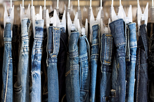 Blue jeans in a clothing store. Horizontal version.