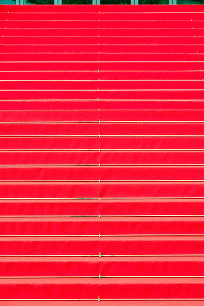 Red carpet in Cannes Real Red carpet in front of Palais des Festivals et des Congres de Cannes. cannes film festival stock pictures, royalty-free photos & images