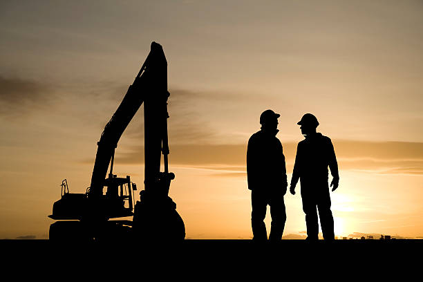 Construction Workers and Equipment stock photo