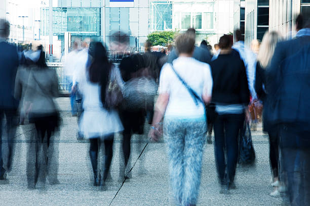 istock Motion blur of business people walking to work 182719758