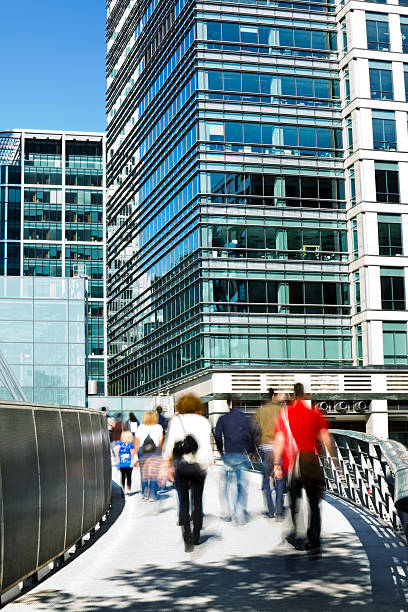 istock People Crossing Footbridge in Financial District 182720043