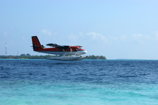 Landing maldivian seaplane - air taxi.