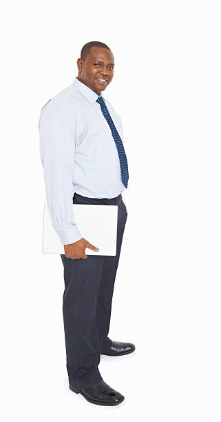 istock Smiling African American young businessman holding documents 182721050