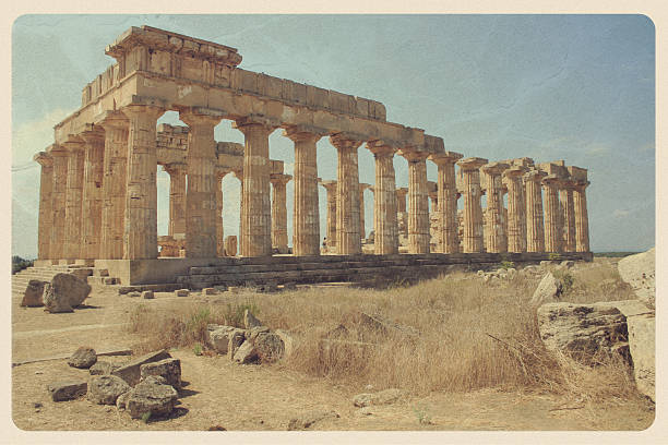 Greek Temple in Sicily - Vintage Postcard "Retro-styled postcard of a magnificient Greek Temple located in Selinunte, Sicily." southern italy photos stock pictures, royalty-free photos & images