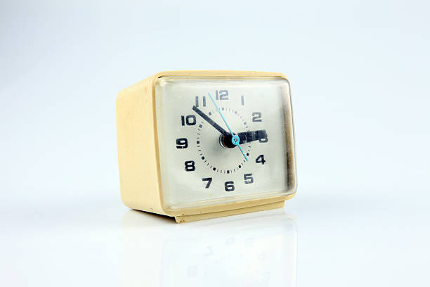 Vintage retro clock isolated on white