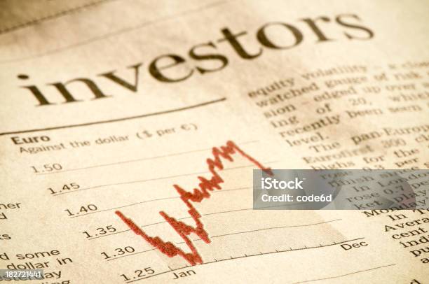 Investment Diagram In Financial Magazine Investors Headline Euro Against Dollar Stock Photo - Download Image Now