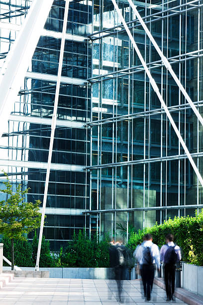 istock Three Businessmen Walking in Front of Modern Office Building, Paris 182722050
