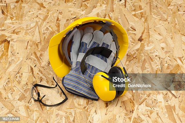 Hardhat Work Gloves And Ear Muffs Stock Photo - Download Image Now - Chipboard, Color Image, Construction Equipment