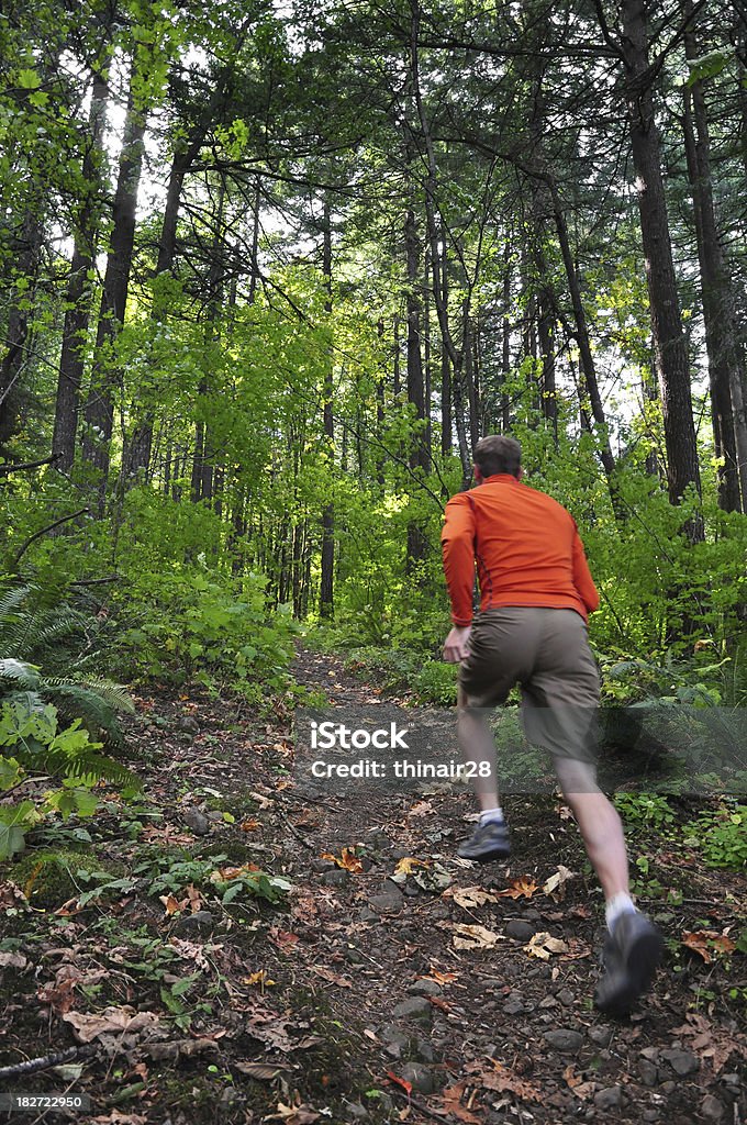 Trail runner "A man running on a trail in the Columbia Gorge, Oregon." Oregon - US State Stock Photo