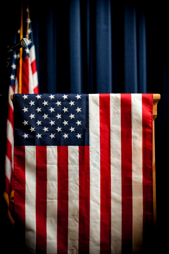 u.s. podium / how can you tell it's u.s. / because of the flags