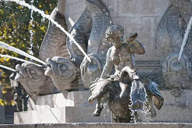 The famous Rotunda Fountain (Fontaine de la Rotonde) in Aix en Provence, France.   The fountain was built in 1860, and is placed on the town's main street, Cours Mirabeau.
