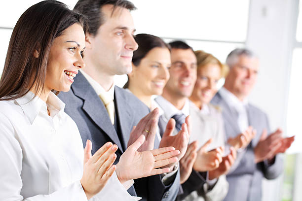 istock Contemporary business people applauding on a conference. 182724048