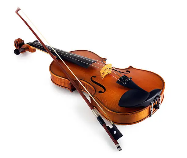 Close-up of a violin with bow isolated on white background