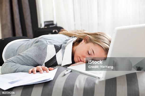 Sleeping Business Traveler Tired Exhausted Napping Working In Hotel Room Stock Photo - Download Image Now