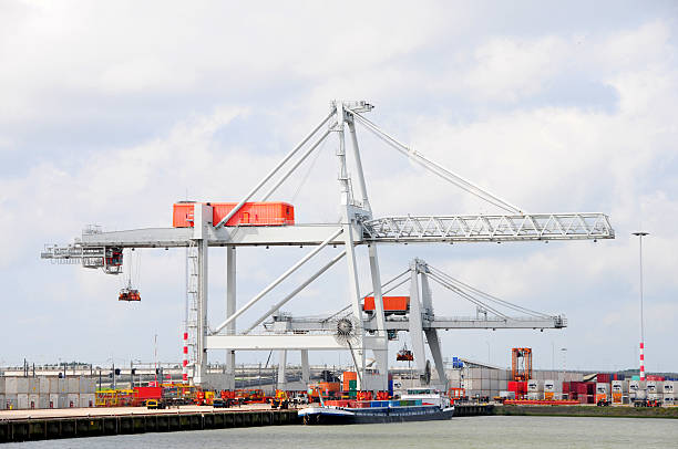 istock Lifting Crane in Rotterdam harbour 182724503
