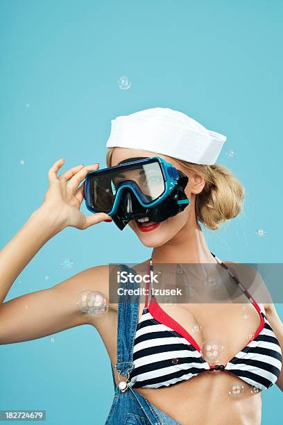 Pinup Style Sailor Woman Looking Through Scuba Mask Stock Photo - Download Image Now