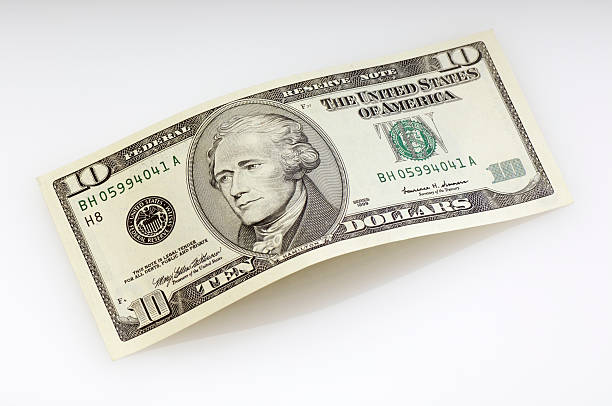 Bent ten dollar bill Bent ten dollar bill. (XXL-File) american one dollar bill photos stock pictures, royalty-free photos & images