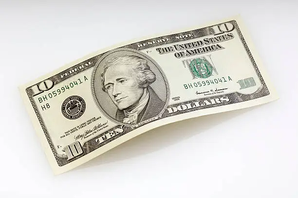 Photo of Bent ten dollar bill