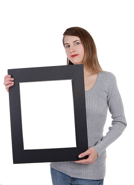 istock Woman Holding Blank Photo Frame 182726228