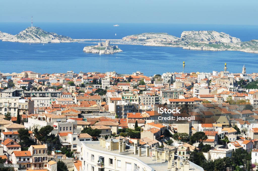 Marseille and view of Chateau d'If "Panorama across Marseille, france and across to the Frioul Islands, including the Chateau d'If where the Count of Monte Christo was imprisoned" Bouches-du-Rhone Stock Photo