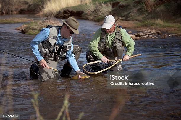 Fly Fishing Guide Catch And Release Stock Photo - Download Image Now - Hunting - Sport, Hunter, Fishing