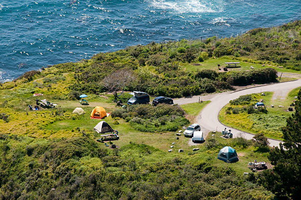 camping along ocean aerial view Camping along the Big Sur/Pacific Coast of California. Kirk Creek Campground, Los Padres National Forest, California, USA. big sur stock pictures, royalty-free photos & images