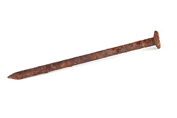 Rusty nail Rusty nail isolated on white. rusty nails stock pictures, royalty-free photos & images