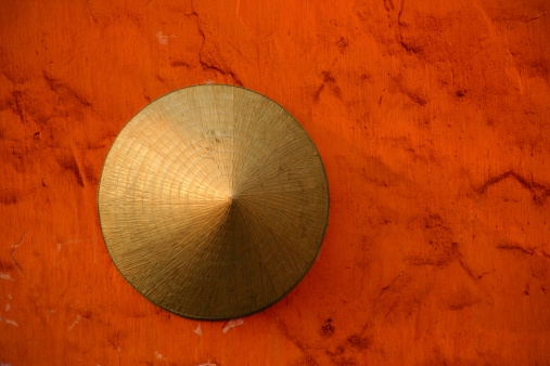 A conical hat hanging on a wall in Vietnam.Also in this series: