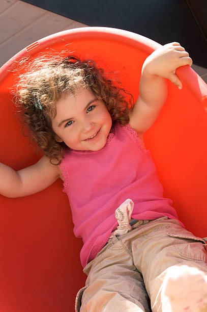istock girl in the sun with a smile 182728093
