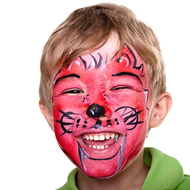 istock Cute little boy with face painting 182729609