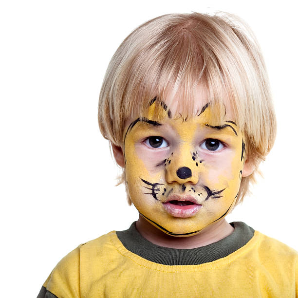 istock Sad little boy with face painting 182729620