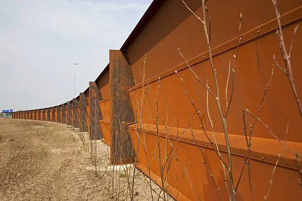 "New rusty sound barrier to reduce traffic noise, please see also my other images of traffic, control and road signs in my lightbox:"