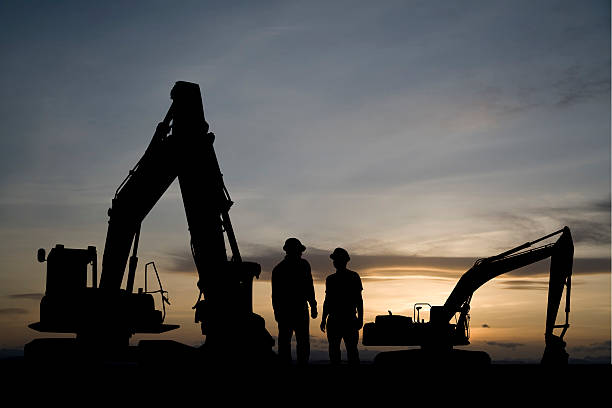 Excavators at Dawn stock photo