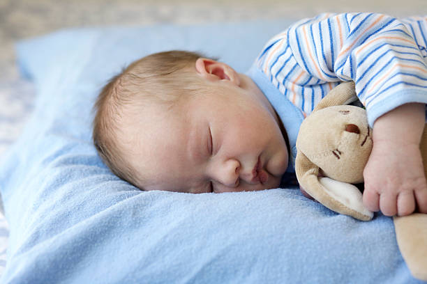 istock Newborn Baby Boy on Blue Blanket 182730702