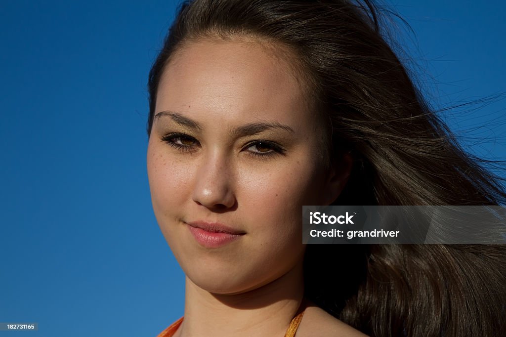 Beautiful Young Woman Beautiful young asian woman outide in a formal dress 14-15 Years Stock Photo
