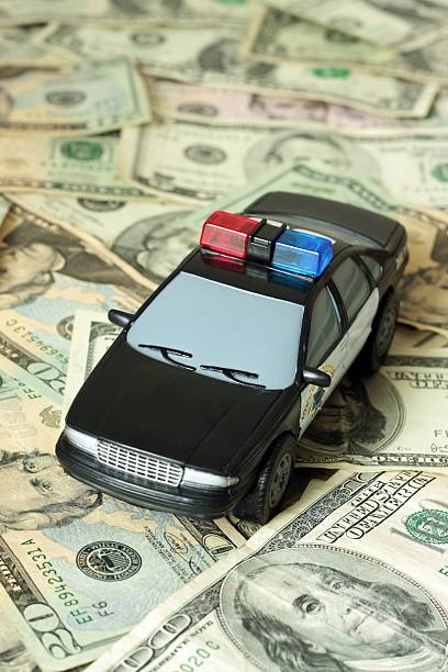 istock Police Car On Cash 182731776