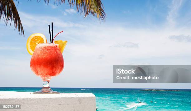 Tequila Sunrise In The Carribeans Stock Photo - Download Image Now - Alcohol - Drink, Cocktail, Cold Drink