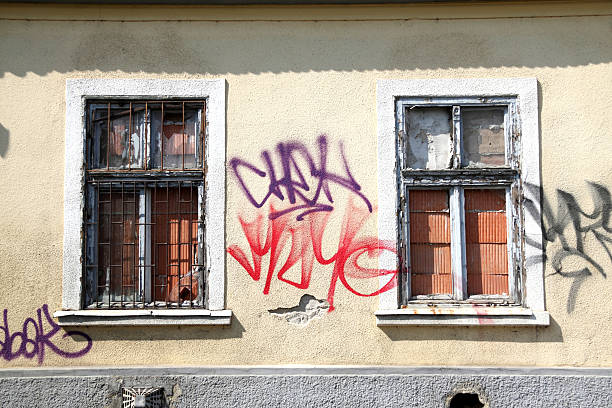 istock dead windows of an old house 182732537