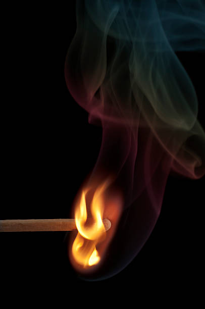 istock Wooden Stick Match Burning with Rainbow Colred Smoke 182732796