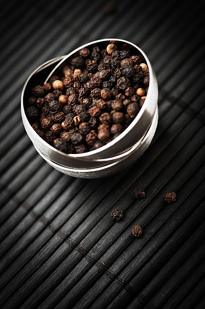 Black pepper corns Black pepper corns black peppercorn photos stock pictures, royalty-free photos & images