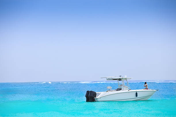 istock Power boat with woman sitting on bow 182734334