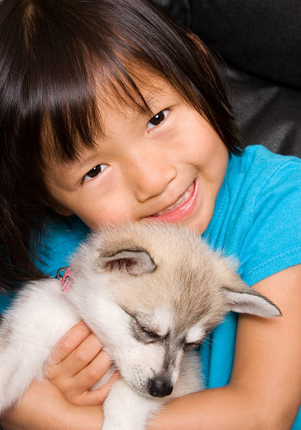 istock Happy with new puppy 182734431