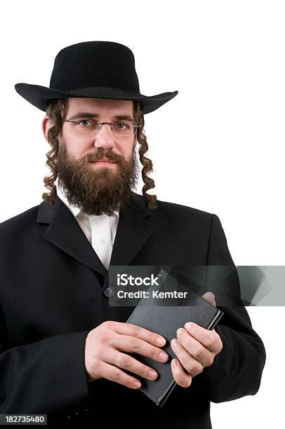 Staring Rabbi Rabbi Holding A Book Stock Photo - Download Image Now - Men, Judaism ...