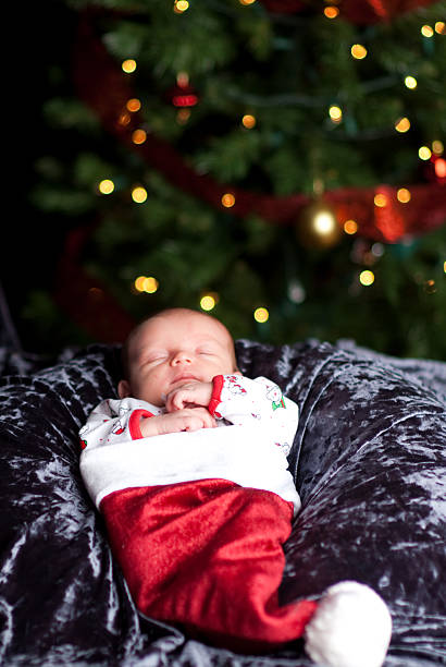 Baby in Santa Hat stock photo